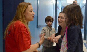 Principal, Denise Polanco Nieves with Louise Marchini and her children