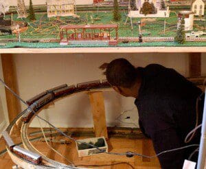 Lee monitors his model trains