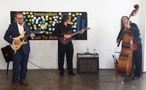 Marco Damiani plays guitar with the Andy Bassford Duo