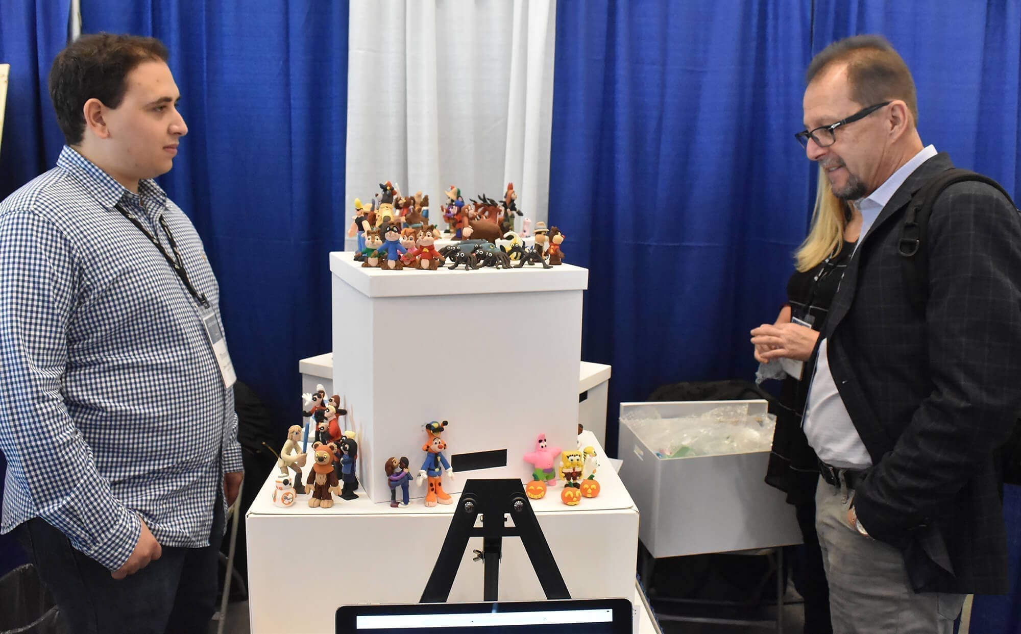 AHRC NYC's CEO, Marco Damiani visits Thomas Gambaro's mini sculpture booth