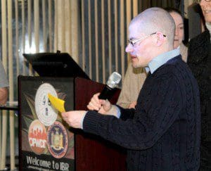 Eric Goldberg read one of the themes that his group indentified as key to the day's conversations