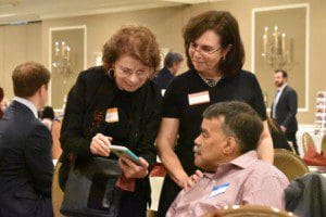 Margaret Puddington interacts with Dr. Carole Gothelf, Associate Vice President for Individualized Supports, and self advocate Bernard Carabello