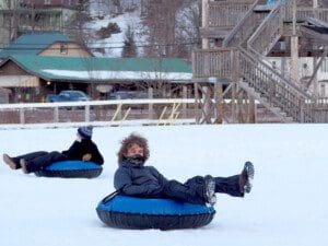 Joe Antcliff and campers enjoy winter activities as a part of AHRC NYC's Overnight Camp Program