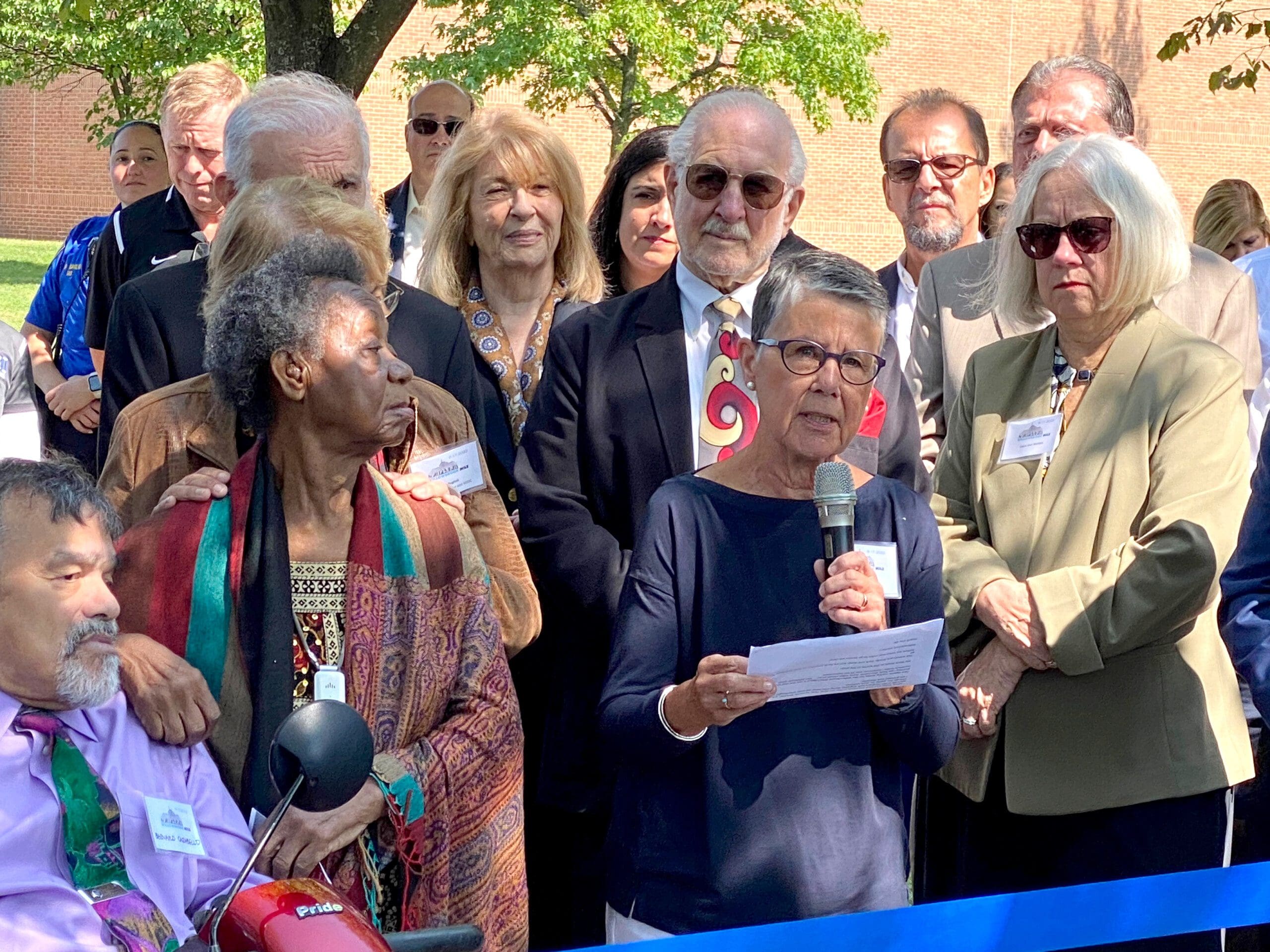 Laura Kennedy speaks at the ceremony following years of advocacy to open the Mile.