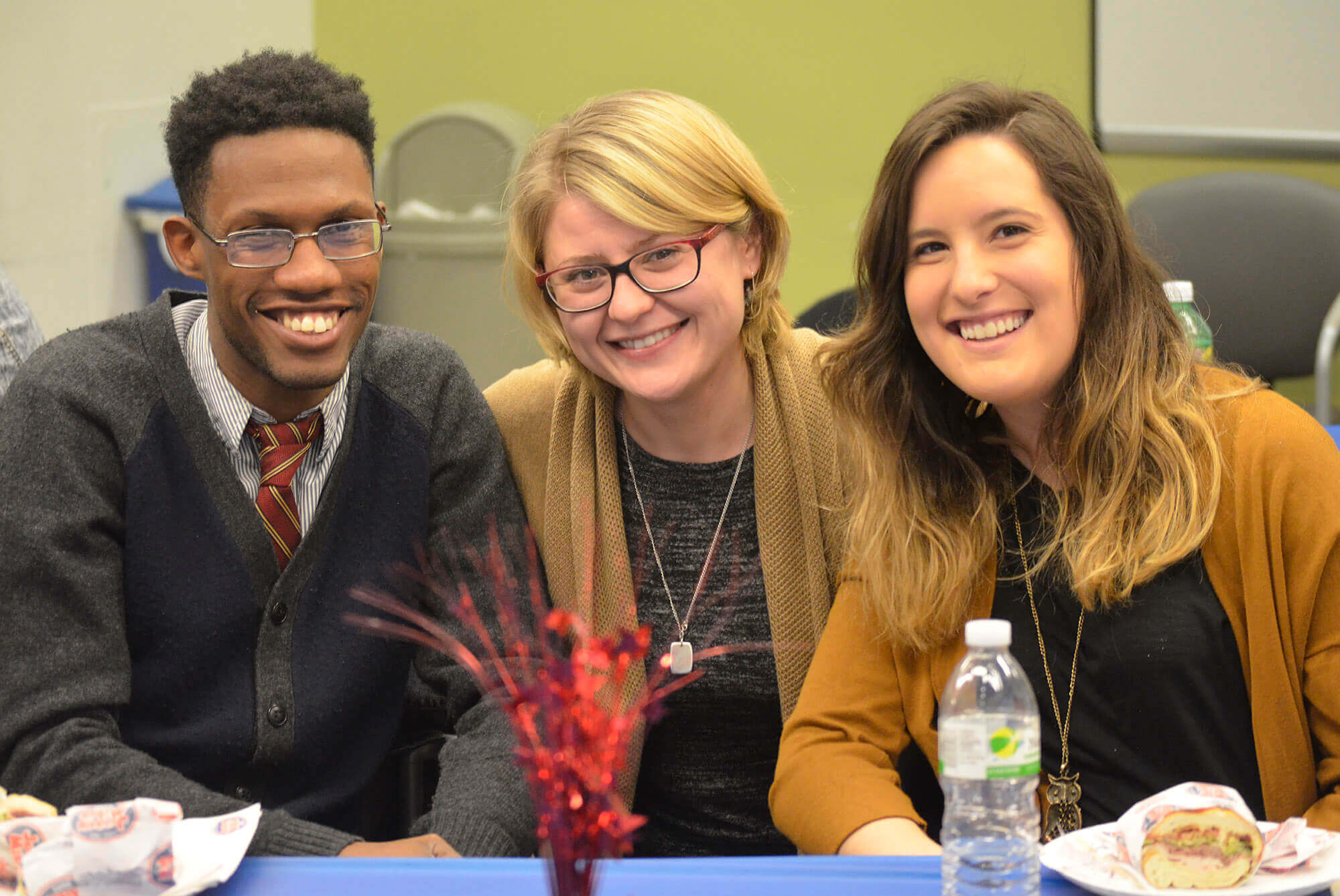 Yuliya Khripunkova of Brooklyn Employment and Business Services, with Social Work Interns Johnny Carrie and Lauren Pelaia