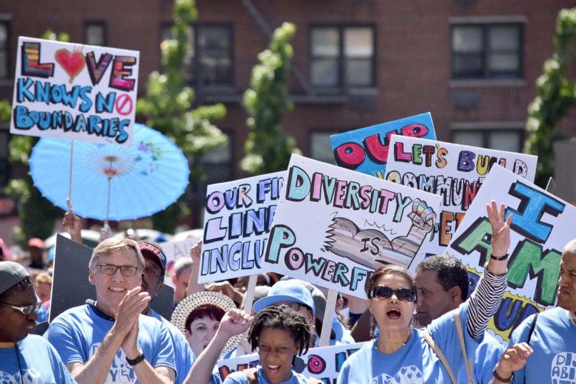 Artists from ArTech worked to create many of the signs that were carried at the parade