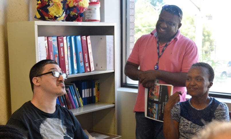 Nixon Darbouze with members of the self advocacy group