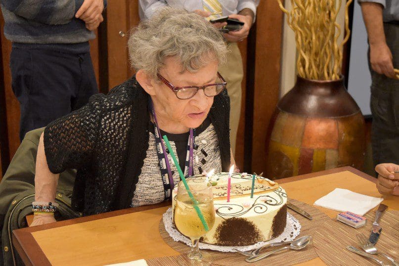 Gilda blows out her candles