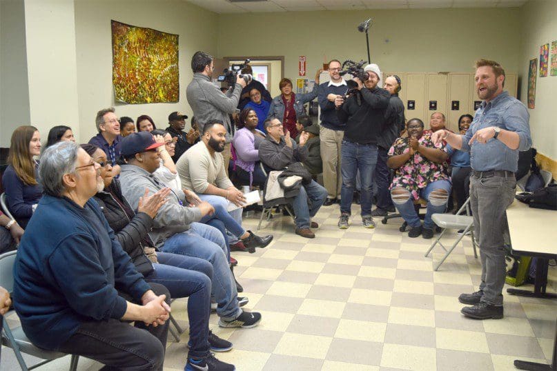 George Oliphant surprises the staff at Fisher Center