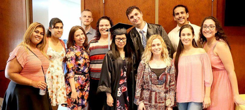 Staff from the MRHEP at the College of Staten Island with graduates Alissa Lontoc and Robert Kranpost