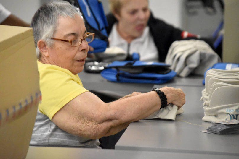 Rose Platnick helped to assemble thank you gifts for AHRC NYC's DSPs