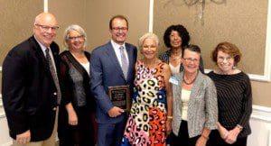 Marco Damiani (holding award) with Angelo Aponte, Anne Gordon, Sharyn Van Reepinghen, Germaine Laviscount Scott, Laura Kennedy, and Margaret Puddington