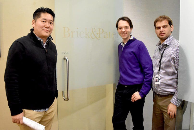 Tsering Phuntsok, Job Coach, with Luke Weber and Joseph Lodispoto