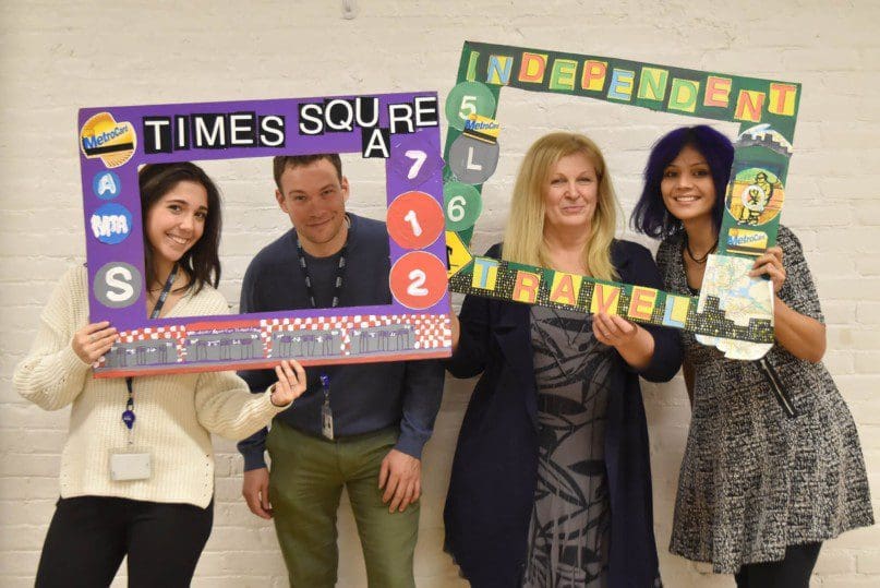 Pola Ana Mora, Jonathan Epstein, Darinka Vlahek, and Christine Demel in the transit theme photo booth