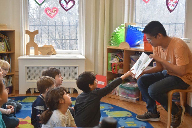 MHS Student Randy read Last Stop on Market street to kindergartners from Poly Prep