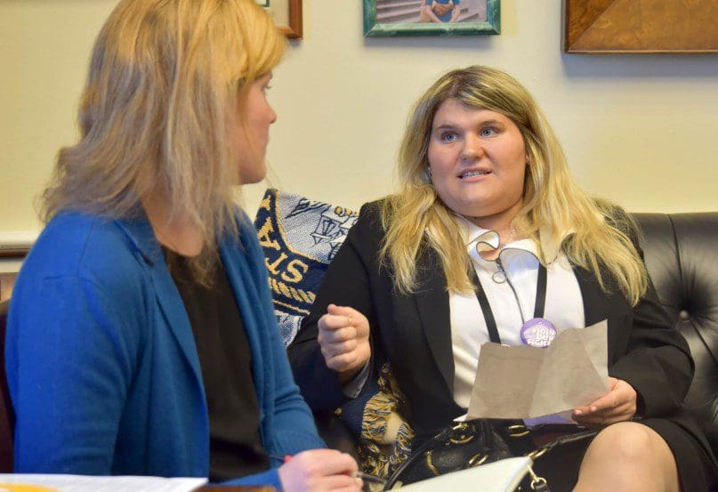 Danielle Levine stated her case for employment opportunities to an aide working with Rep. Carolyn Malon