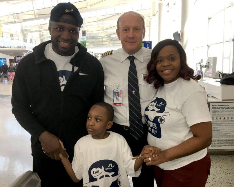 The Dennard family with United Airlines pilot Captain Mike Neff
