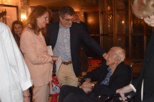 Laura and Steve Riggio greet Jack Gorelick at his 100th birthday celebration