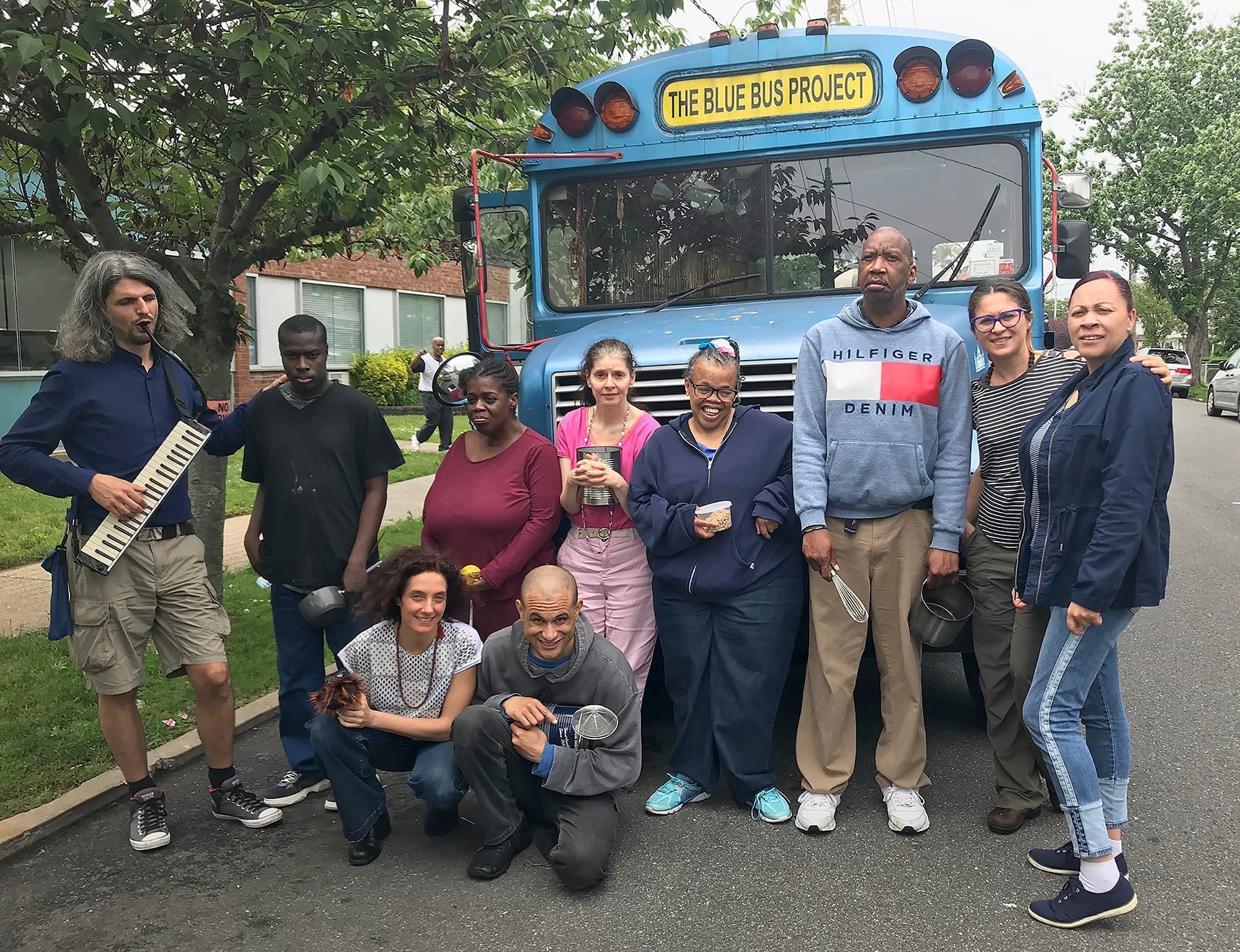The members of Lyrical Play, the Blue Bus Project's musical collaboration with Far Rockaway Day Services