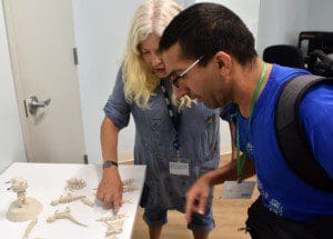 Bonnie Astor, Art Consultant, and Danny Groner looked over 3D printed figurines at Joseph T. Weingold Day Center.