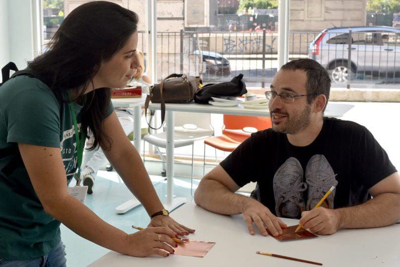 Shani Aroch and a person supported by Shekel created their own copper engravings as part of the group art project.