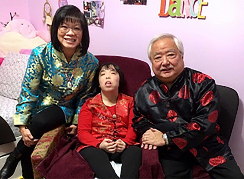 Samantha Cheung with her parents Susan and Peter.