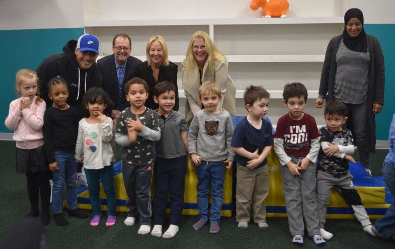 Gleyber Torres, Marco Damiani, Alyssa Isaacson, and Darcy Stacom with children from Central Park Early Learning Center