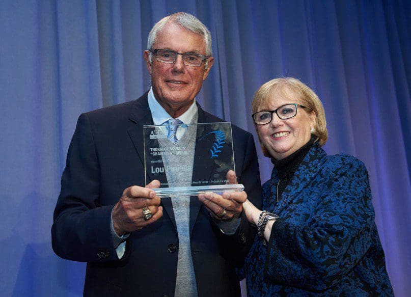 Lou Piniella receives the Thurman Munson Champion Award from Diana Munson