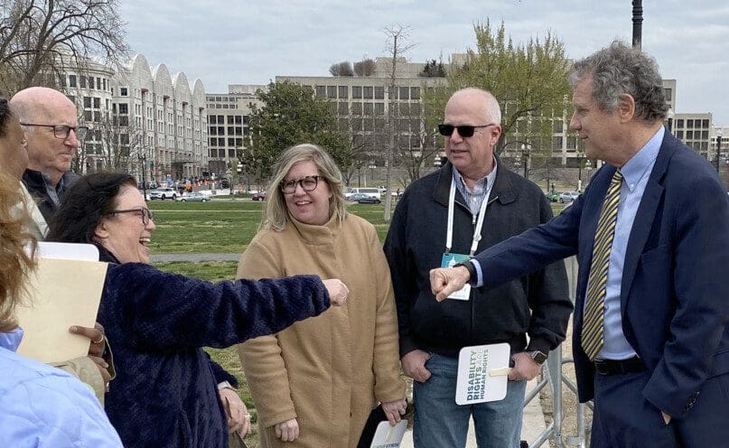 Senator Sherrod Brown greets constituents from Ohio following his speech supporting disability rights.