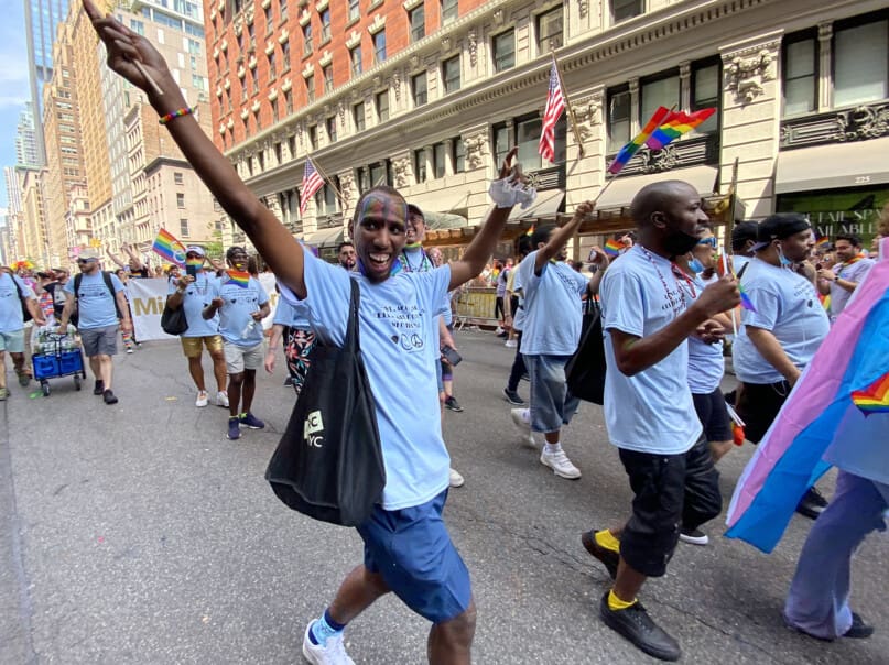 Jamel Mills parades down Fifth Avenue.