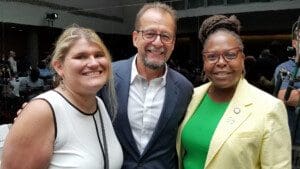 Danielle Levine, self advocate, Marco Damiani, AHRC NYC's CEO, and Stefani Zinerman, NYS Assembly Member, District 56