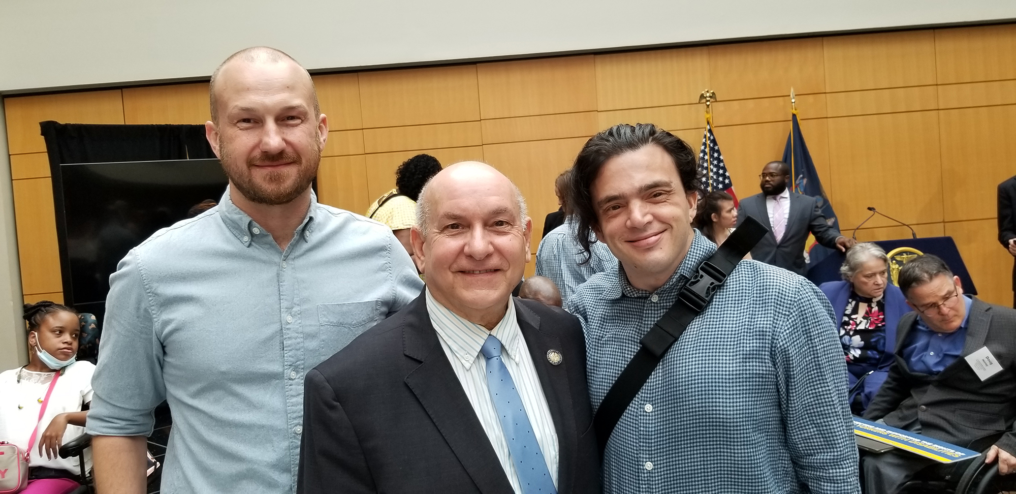 Attendees celebrated the signing of a package of bills strengthening the rights of New Yorkers with disabilities.