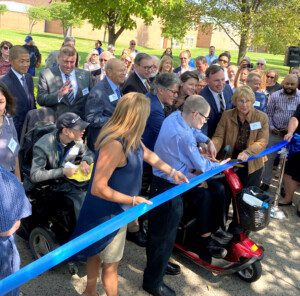 Eric Goldberg, Geraldo Rivera, and others cut the Willowbrook Mile ribbon.