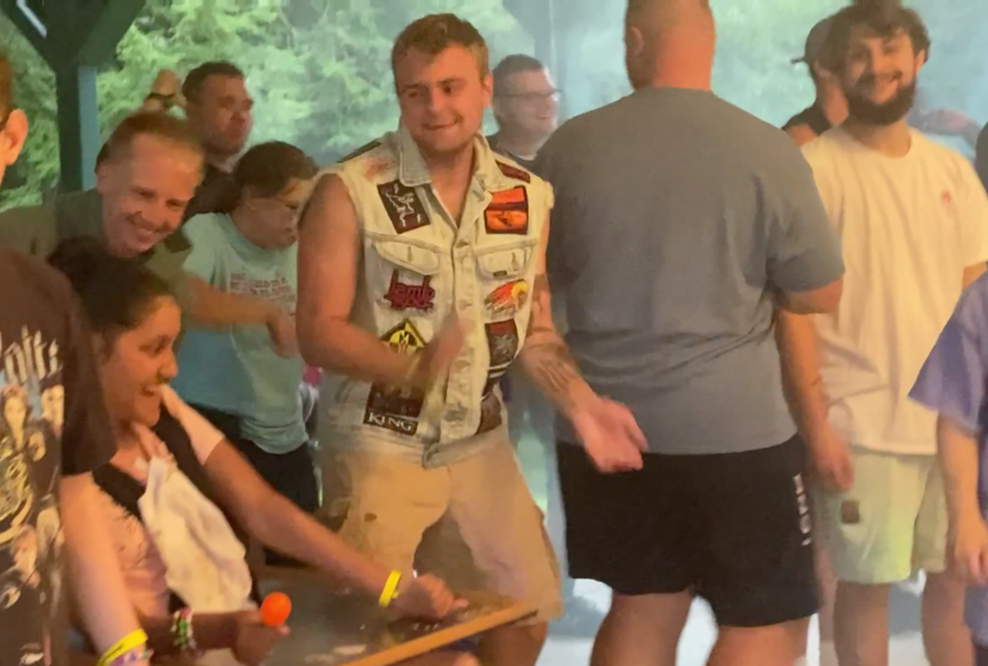Tom McSharry dances with guests during the Lodgeapalooza music festival.