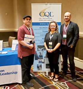 Pancho Diaz, QI Officer with Laura Cucinotta, Senior QI Officer, and Matthew Estep, Self Advocacy Advisor at the 2022 CQL Conference