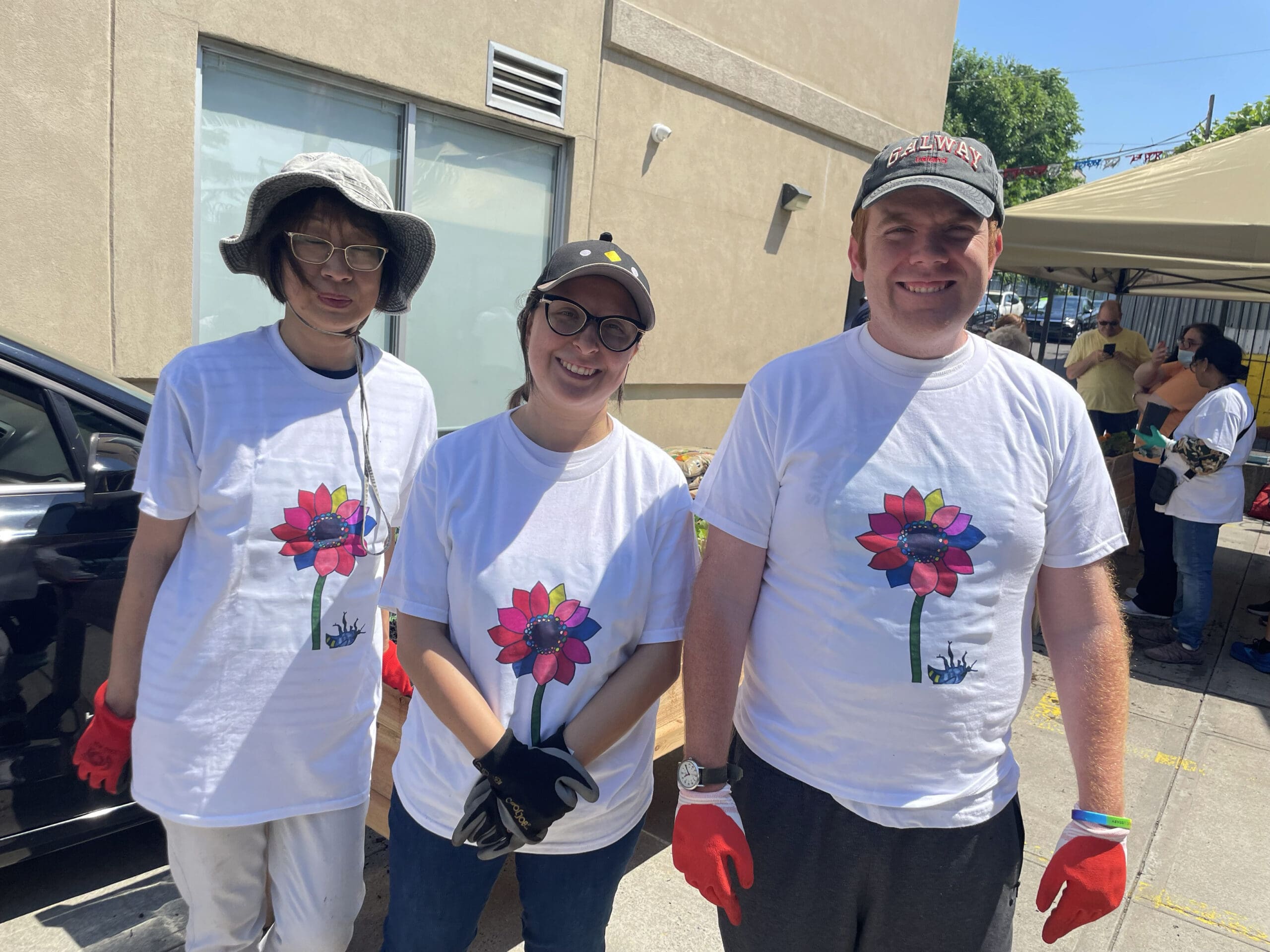 Brendan Berry with gardening volunteers in Elmhurst