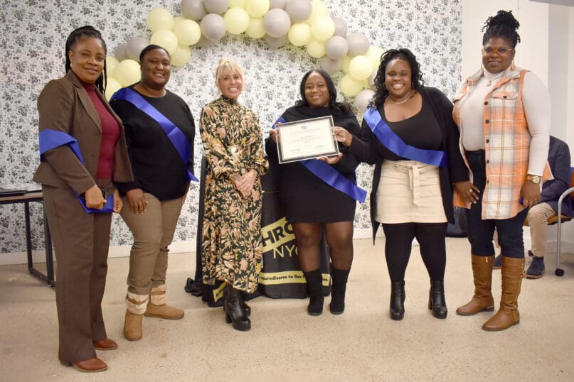 Bronx based Residential Services staff members proudly show their certificates