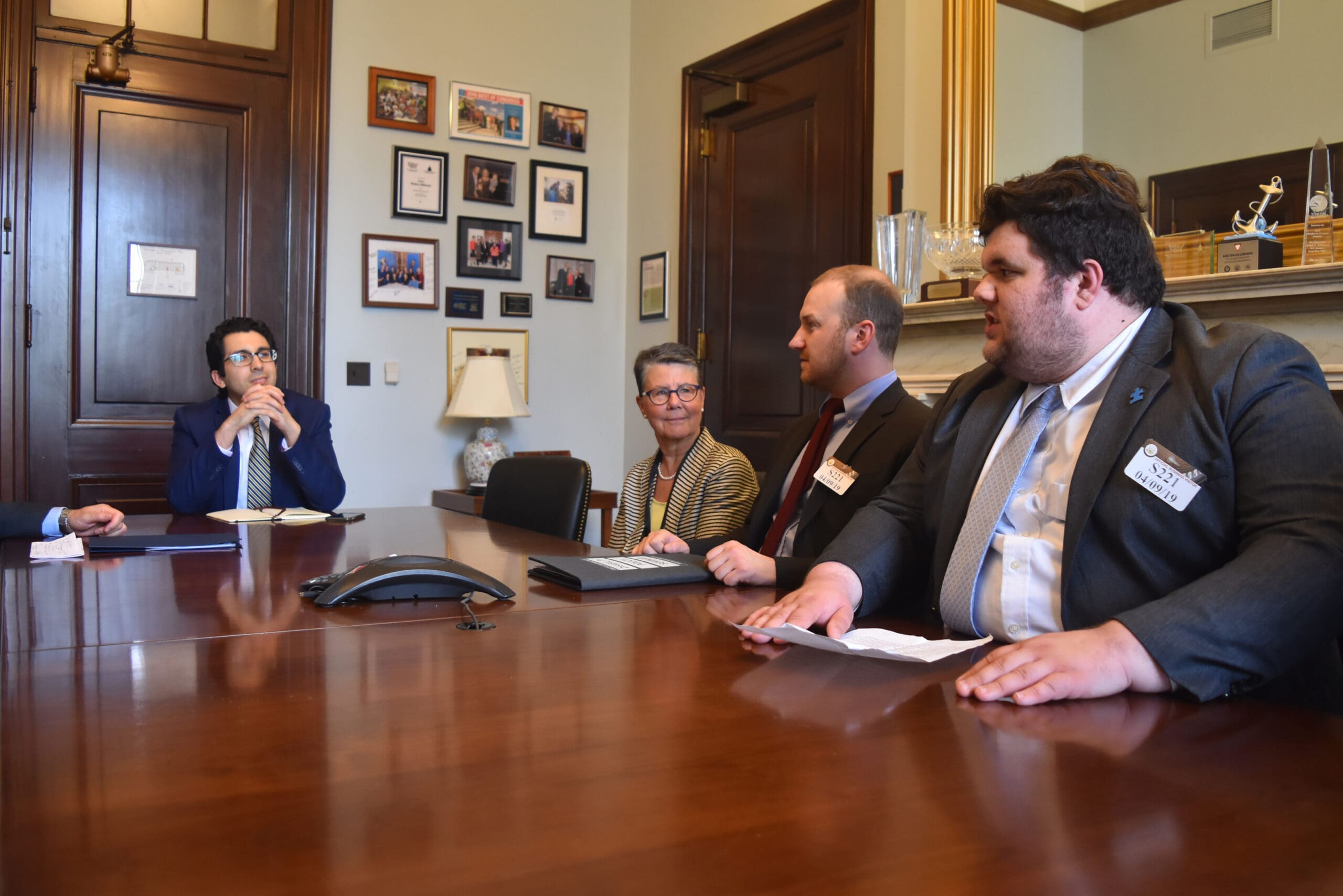 An aide to Senator Kirsten Gillibrand listened to self advocate Michael Carbonaro state his case for educational opportunities