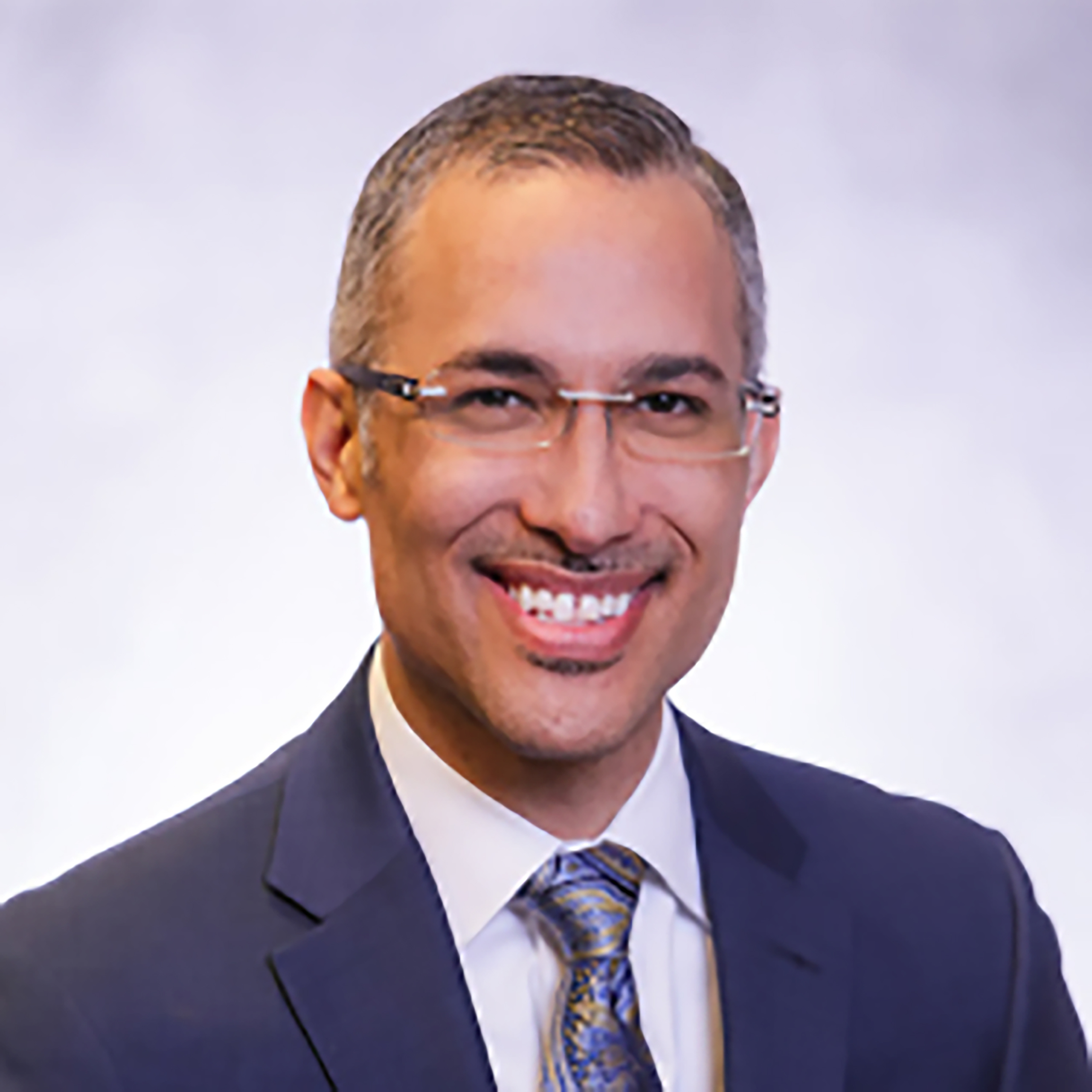A portrait of Daniel E. Dawes, JD, Executive Director of the Satcher Health Leadership Institute at Morehouse School of Medicine
