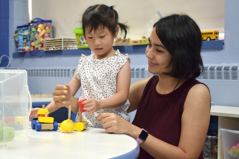 A teacher and student at James P. Murphy Staten Island Preparatory School