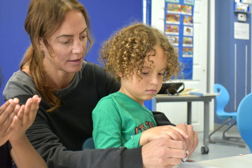 A teacher and student at James P. Murphy Staten Island Preparatory School