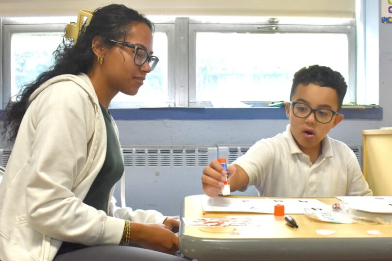 A teacher and student at James P. Murphy Staten Island Preparatory School