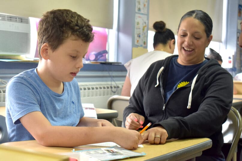 A teacher and student at James P. Murphy Staten Island Preparatory School