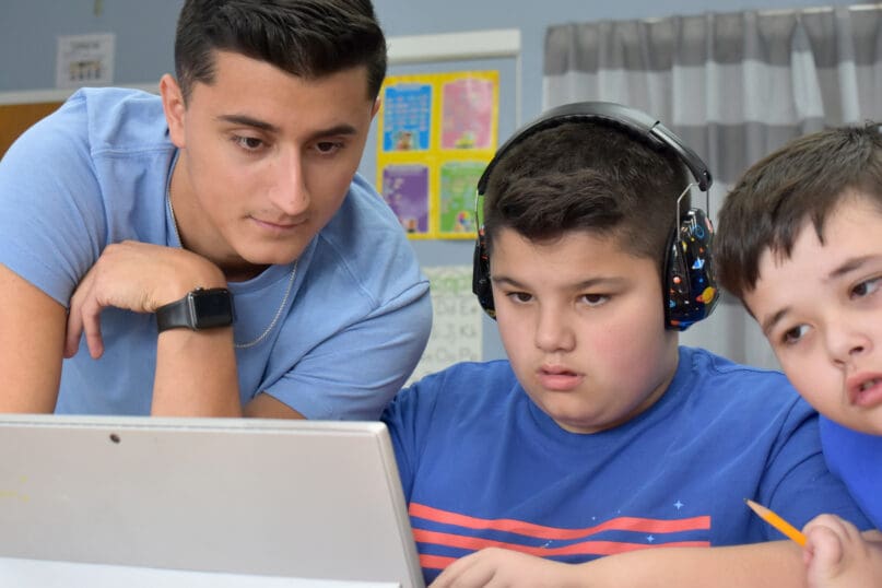 A teacher and students at James P. Murphy Staten Island Preparatory School