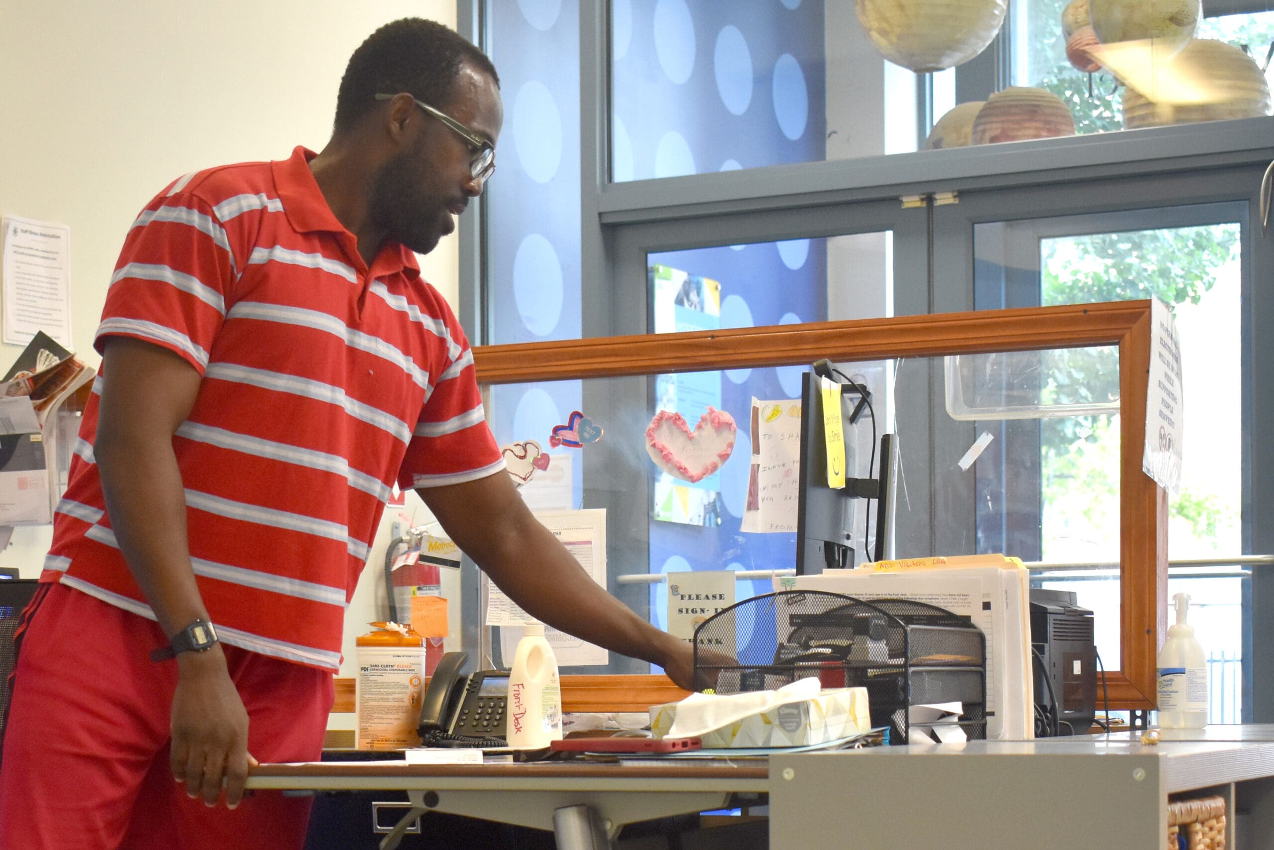 Makenson splits his week between his job at CVS and helping out at the front desk of his day program.