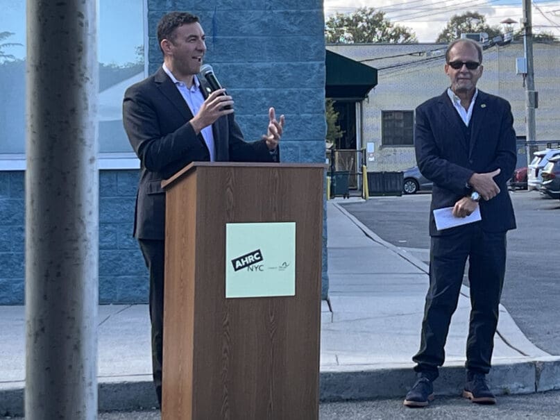 New York City Council member, Eric Dinowitz, (District 11) speaks at the naming ceremony for the Bill & Howie Stone Center