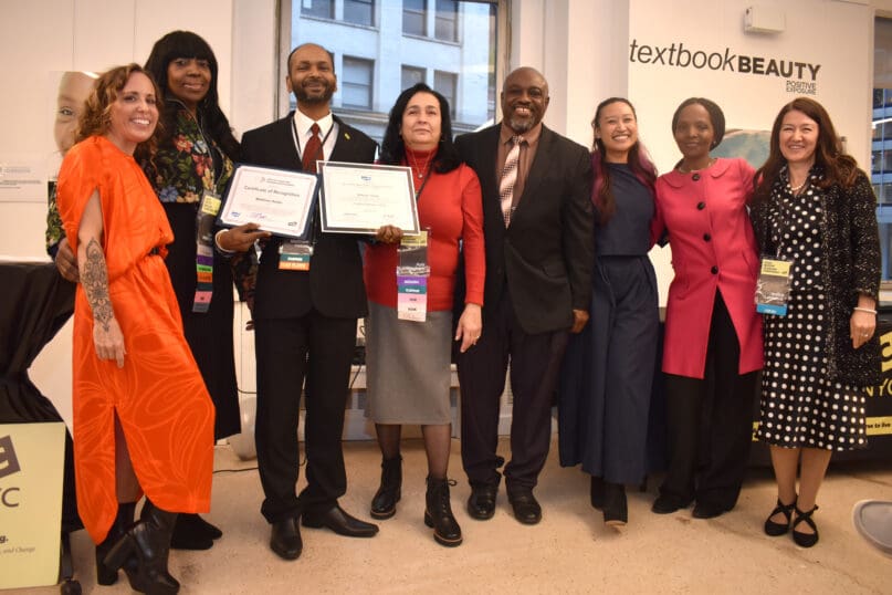 AHRC Fisher Day Services colleagues congratulate Matthew Halder, who named valedictorian of the 2025 AHRC NYC NADSP cohort