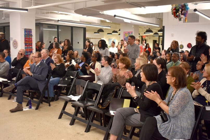 Attendees celebrate careers of service at AHRC NYC's Staff Recognition event.
