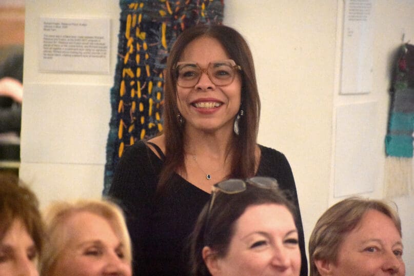 Daisy Arroyo stands proudly at our 2026 Staff Recognition Event