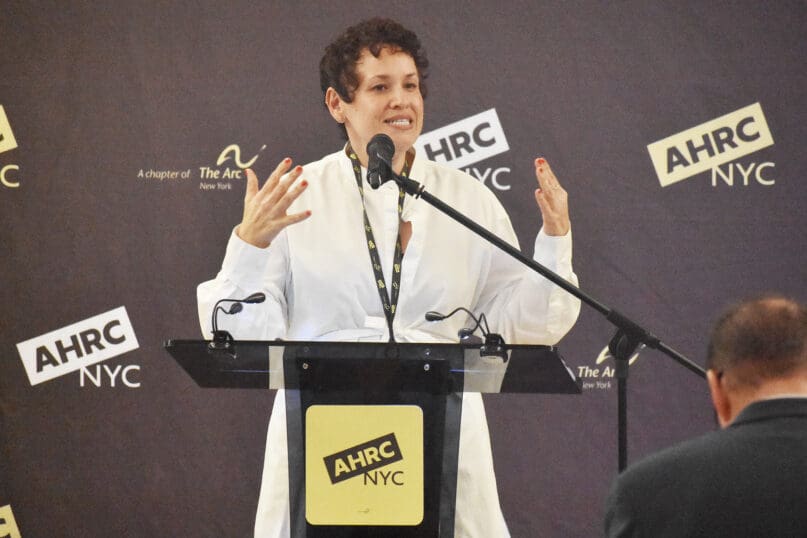 AHRC NYC's Executive Vice President, Chief Operating Officer, Lorelei Atalie Vargas speaks to attendees of the event.